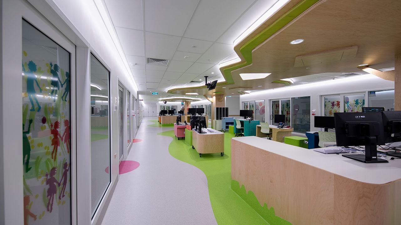 A colorful hospital ward common area